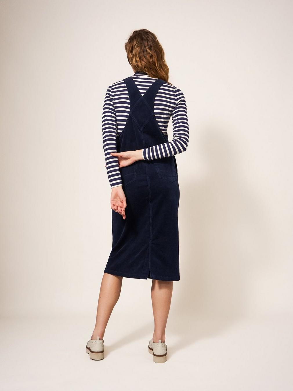 Emmie Organic Cord Pinafore in DARK NAVY - MODEL BACK