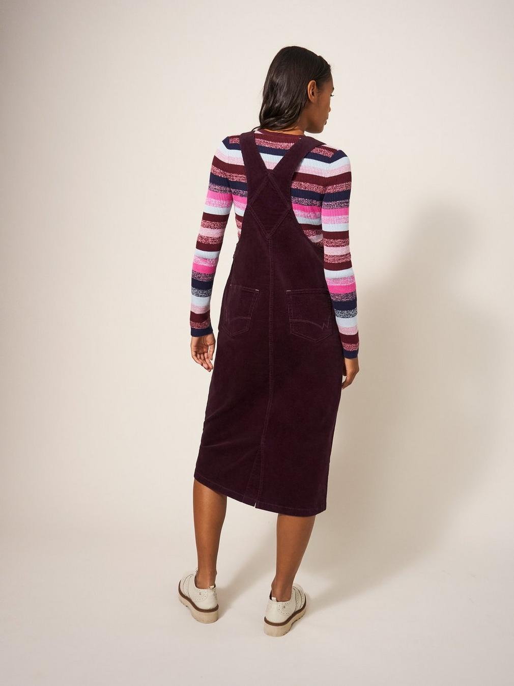 Emmie Organic Cord Pinafore in DK PLUM - MODEL BACK