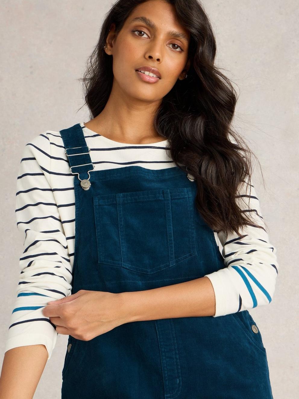 Emmie Organic Cord Pinafore in DK TEAL - MODEL DETAIL