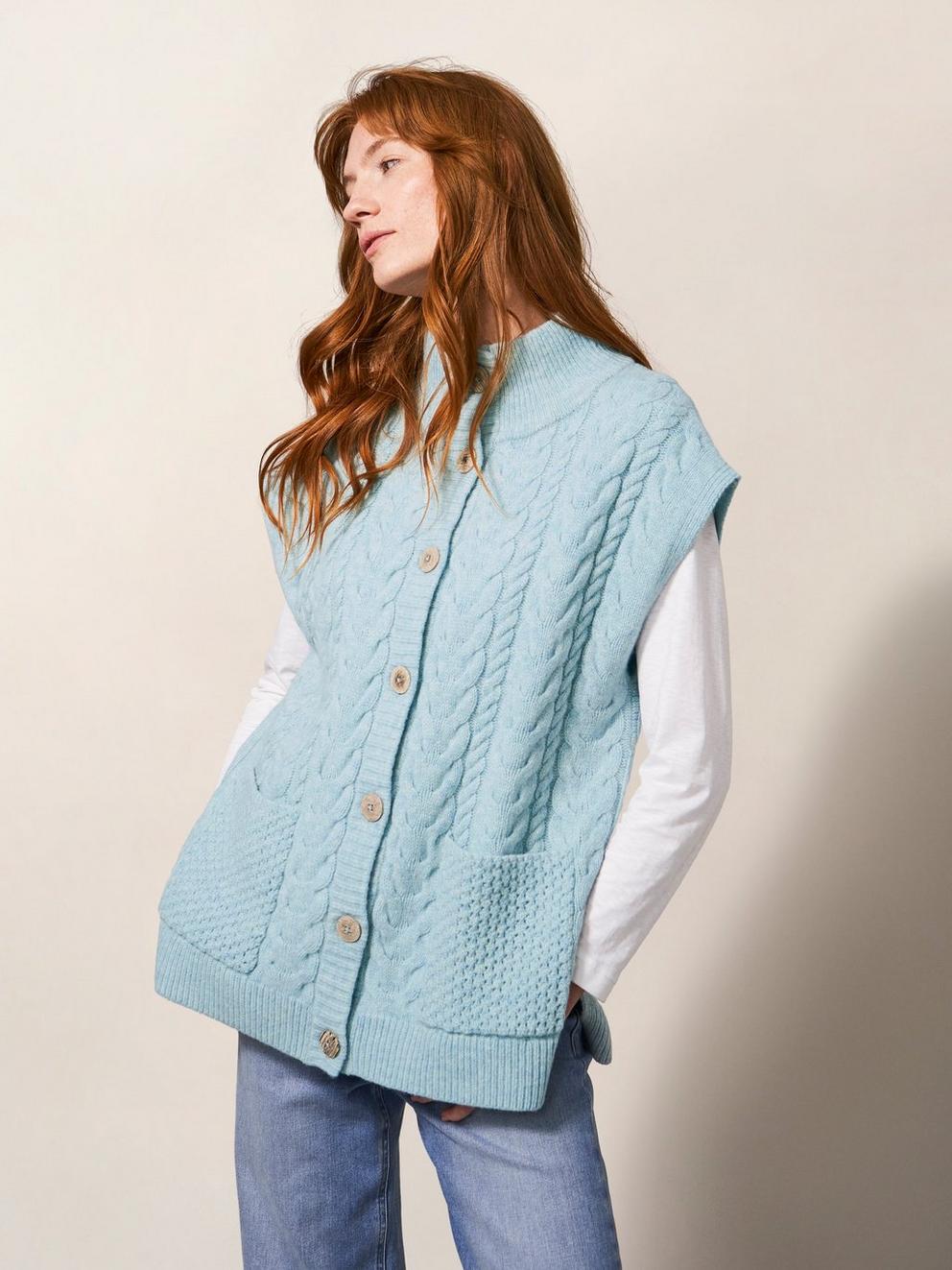 Chestnut Cable Knit Pocket Poncho in LGT BLUE - MODEL FRONT