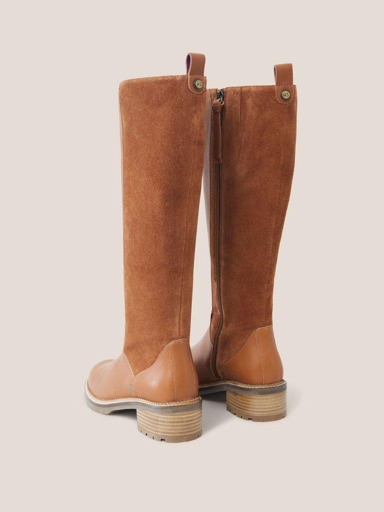 Flat best sale tan boots