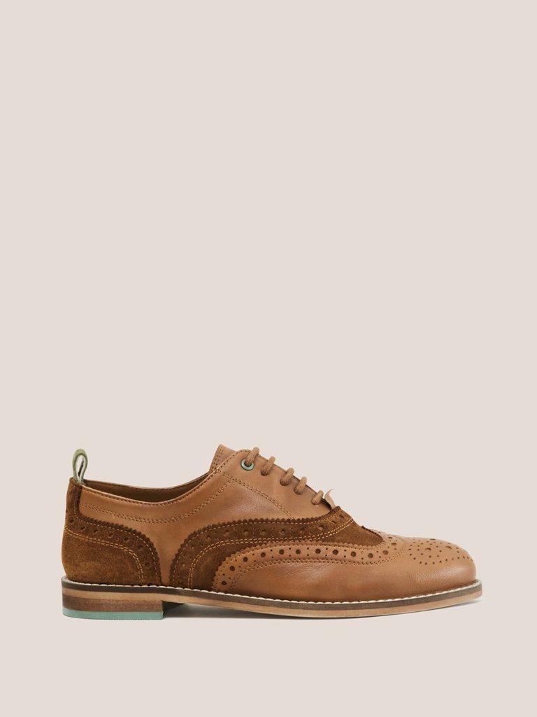 Thistle Leather Lace Up Brogue in DARK TAN - MODEL FRONT