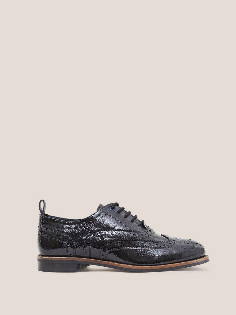 Thistle Patent Lace Up Brogue in PURE BLK - MODEL FRONT