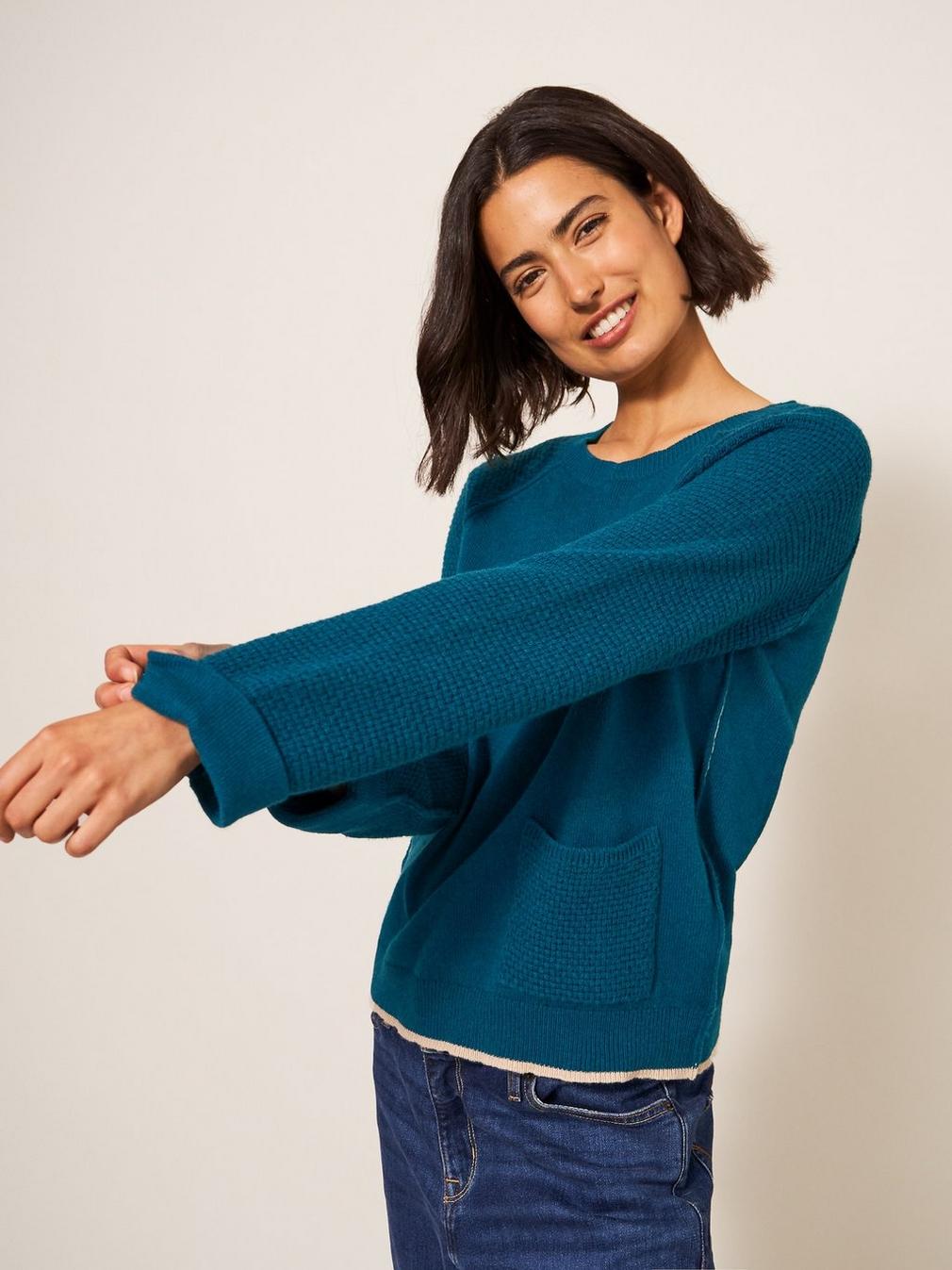 TYNE CREW NECK JUMPER in DK TEAL - MODEL DETAIL