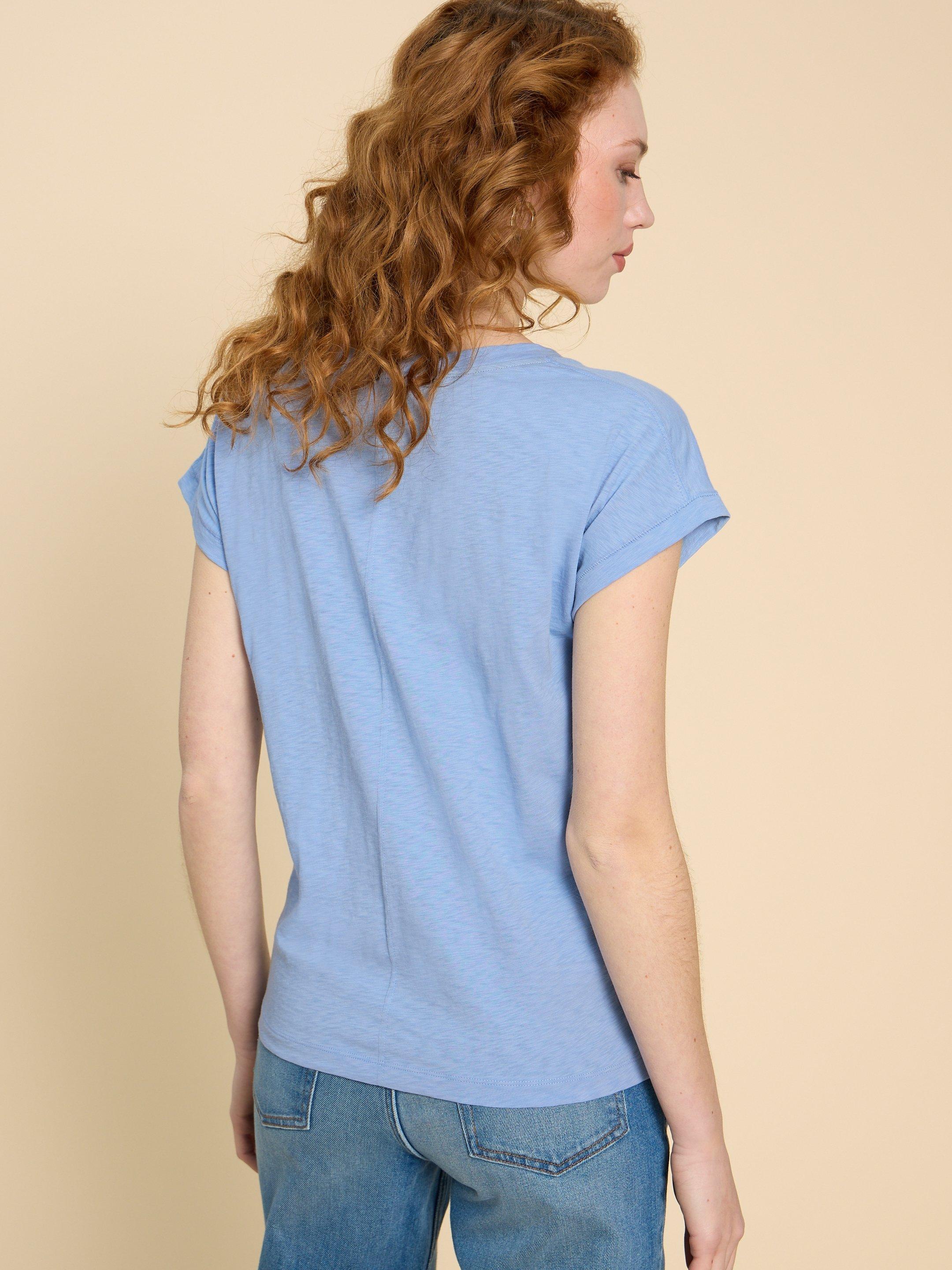 NELLY NOTCH NECK COTTON TEE in LGT BLUE - MODEL BACK