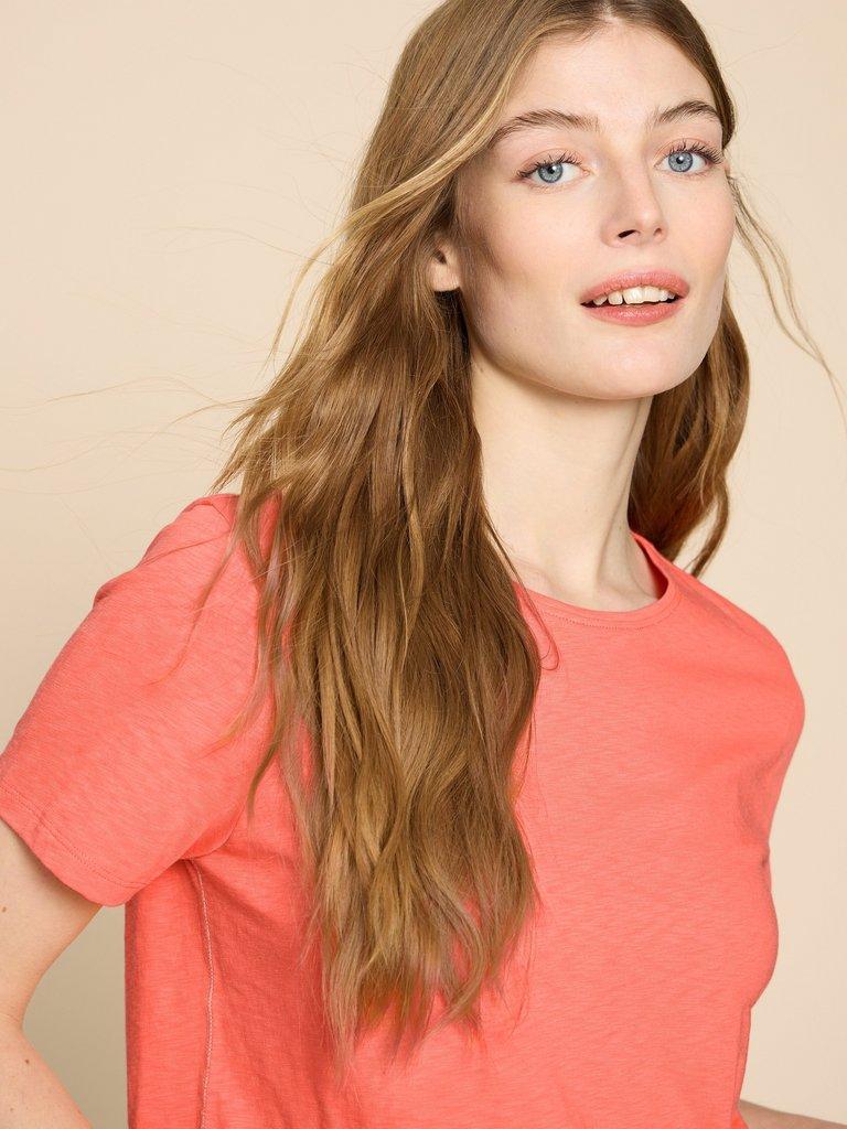 ABBIE TEE in BRT ORANGE - MODEL DETAIL