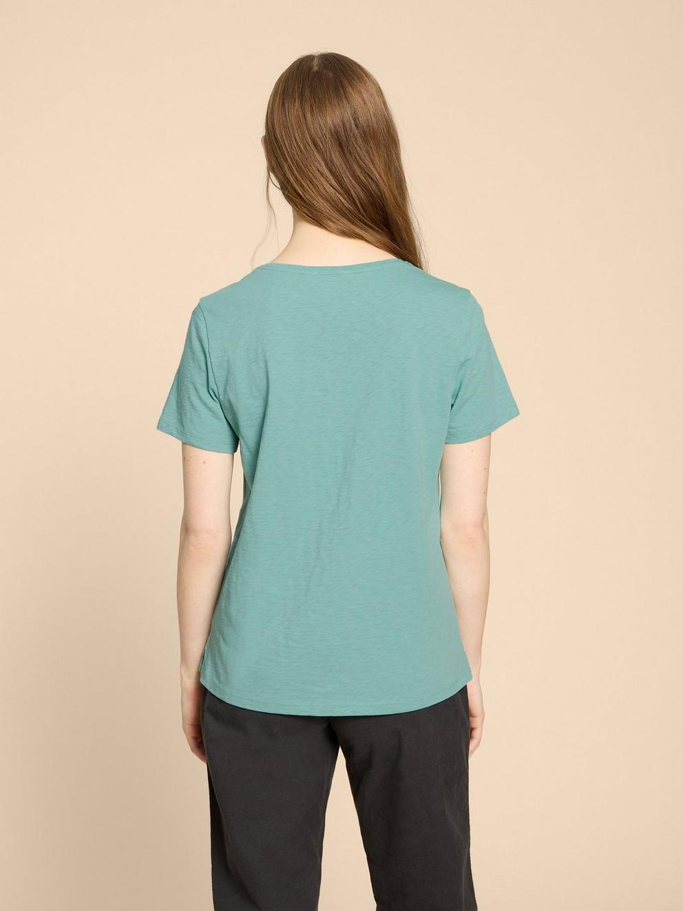 ABBIE TEE in MID TEAL - MODEL BACK