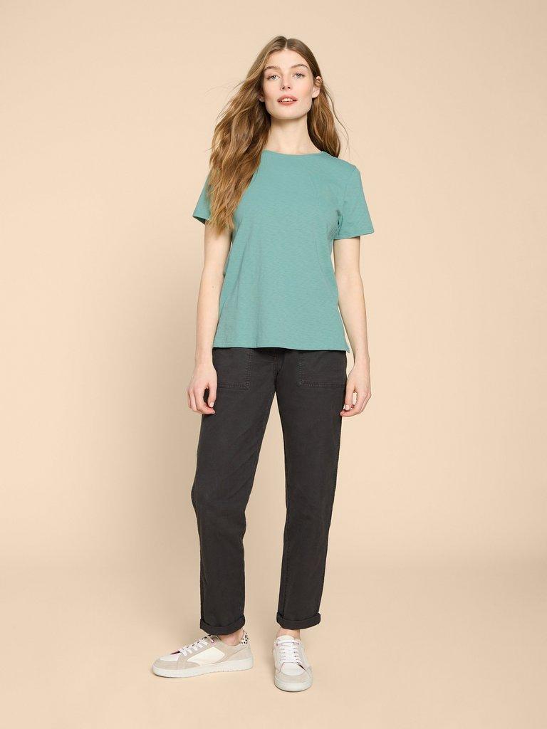 ABBIE TEE in MID TEAL - MODEL FRONT