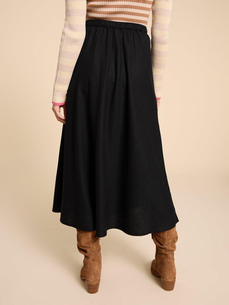 Clemence Linen Blend Skirt in PURE BLK - MODEL BACK