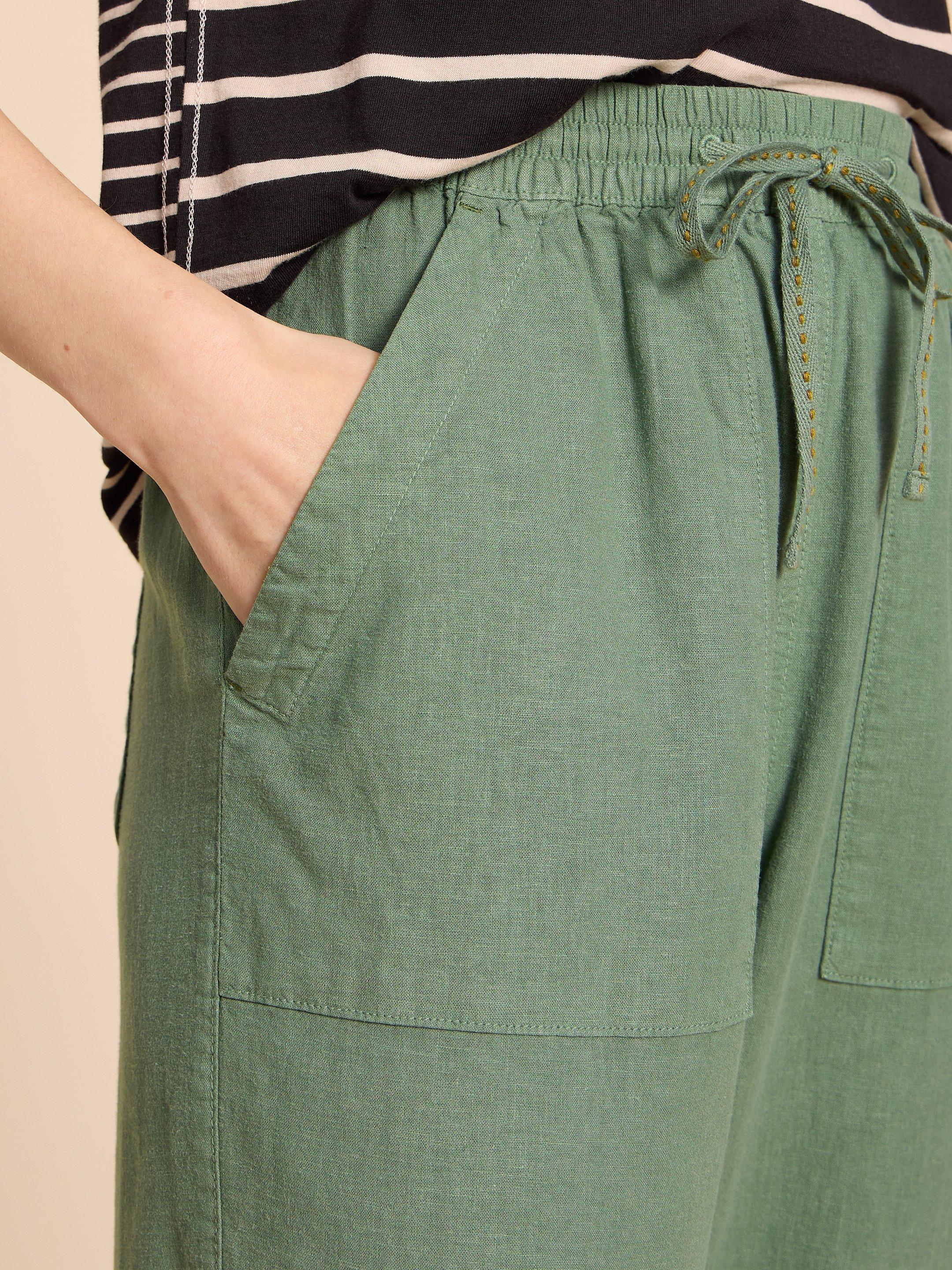 Elle Linen Blend Trouser in MID GREEN - MODEL FRONT