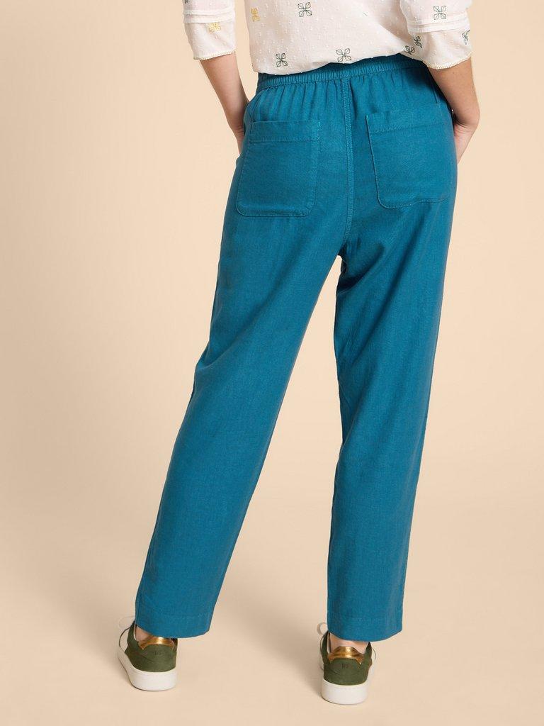 Elle Linen Blend Trouser in MID TEAL - MODEL BACK