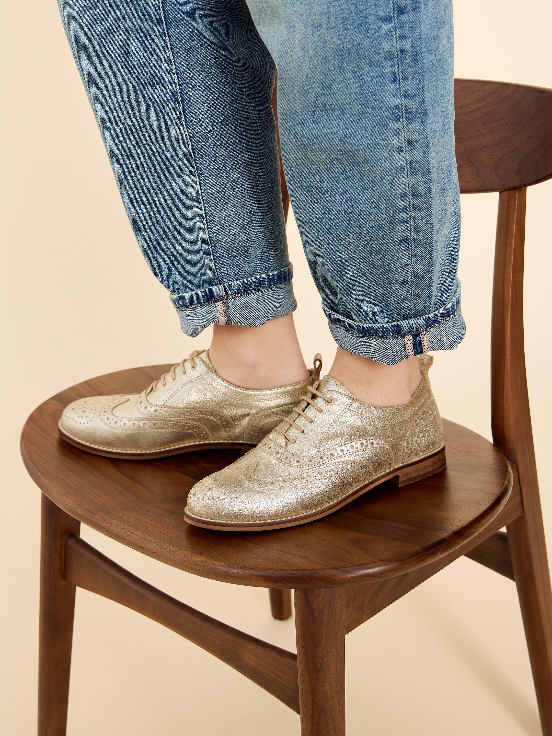 Thistle Lace Up Leather Brogue in GLD TN MET - MODEL FRONT
