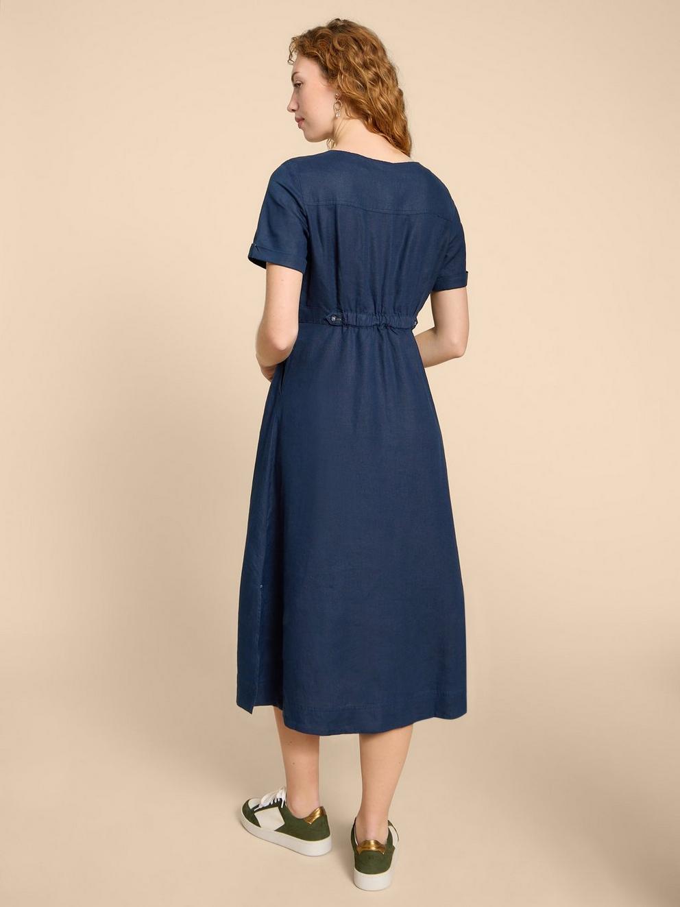 Ivy Linen V Neck Midi Dress in DARK NAVY - MODEL BACK