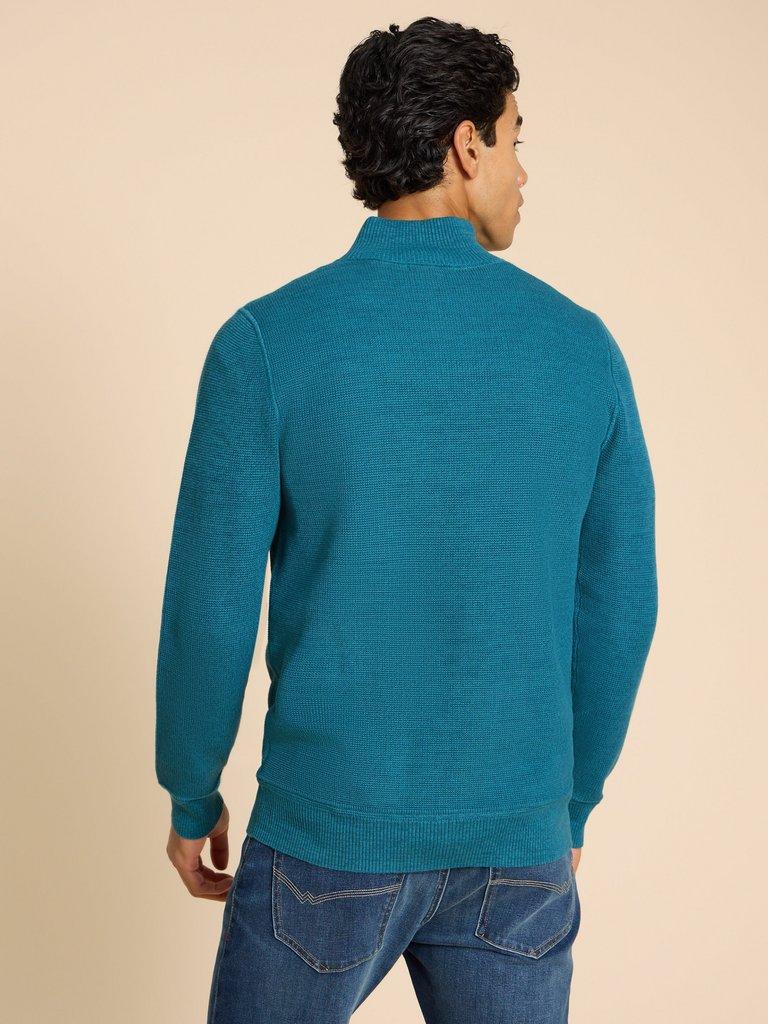 Attadale Funnel Neck Jumper in MID TEAL - MODEL BACK