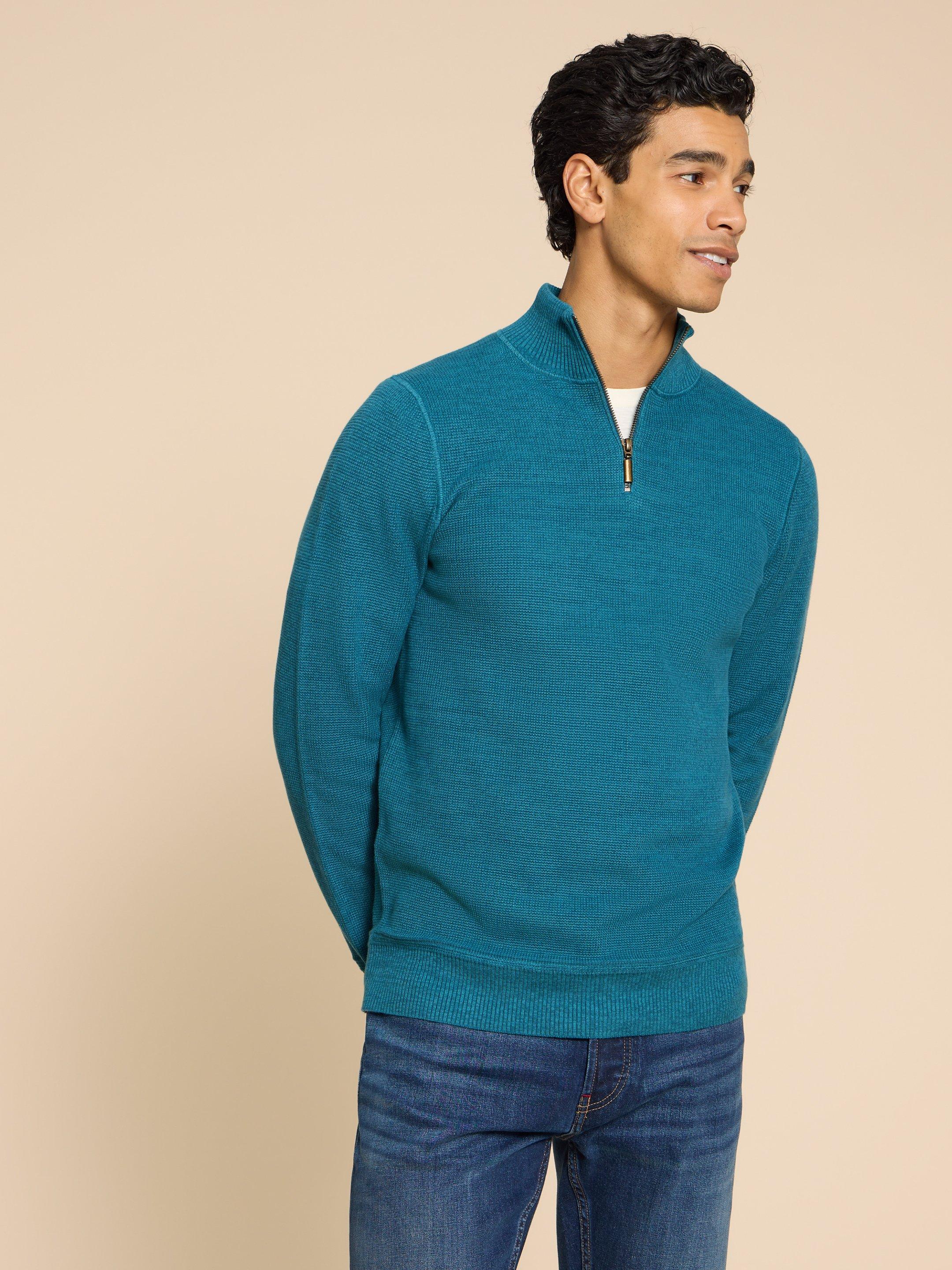 Attadale Funnel Neck Jumper in MID TEAL - MODEL FRONT