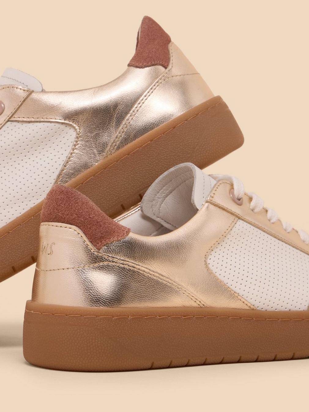 Dahlia Leather Trainer in GLD TN MET - FLAT DETAIL