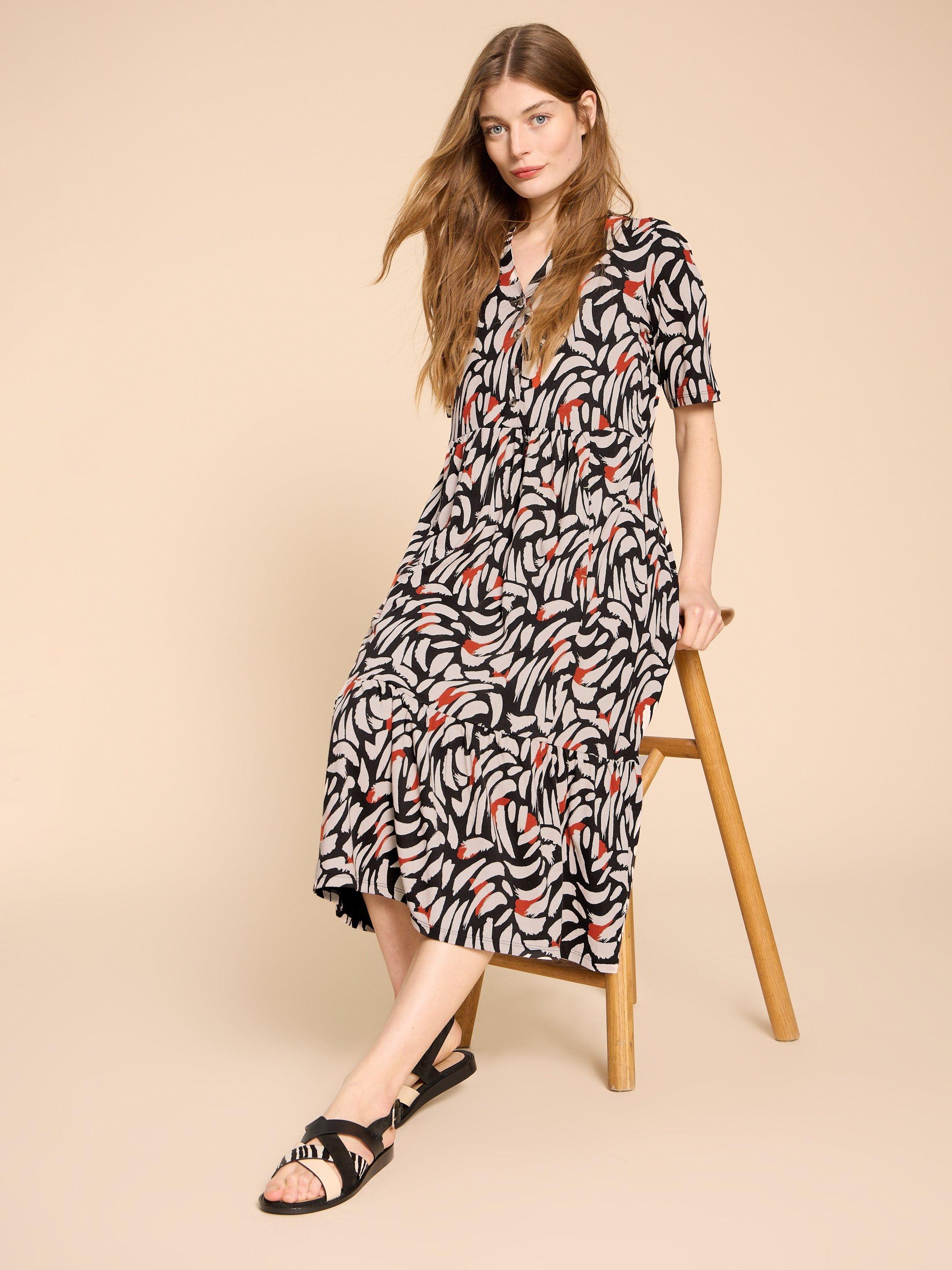Naya Jersey Printed Tiered Dress in BLK MLT - MODEL FRONT