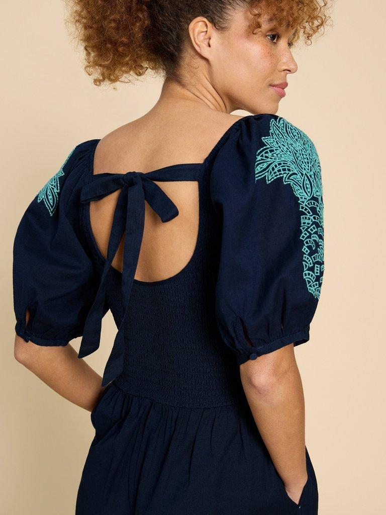 Reese Embroidered Jumpsuit in DARK NAVY - MODEL DETAIL