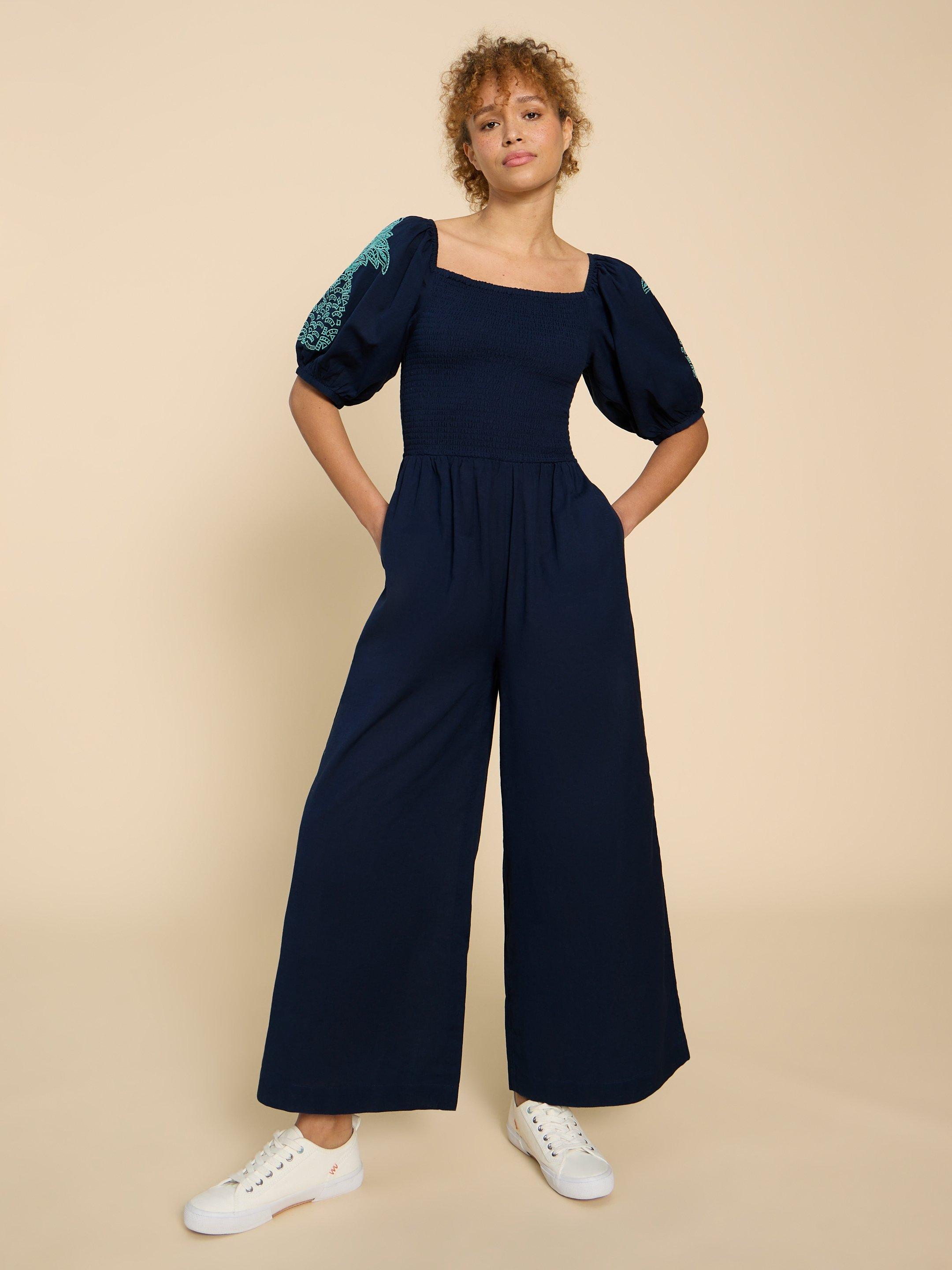 Reese Embroidered Jumpsuit in DARK NAVY - MODEL FRONT