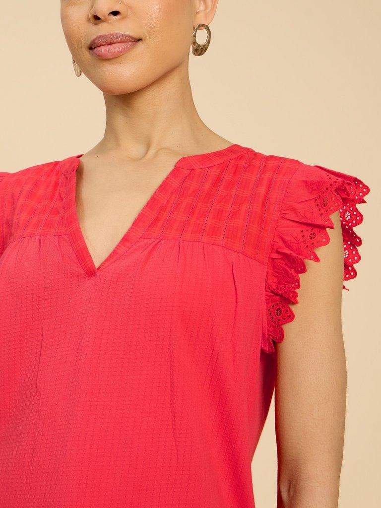 TESSA WOVEN FRILL TOP in BRT ORANGE - MODEL BACK