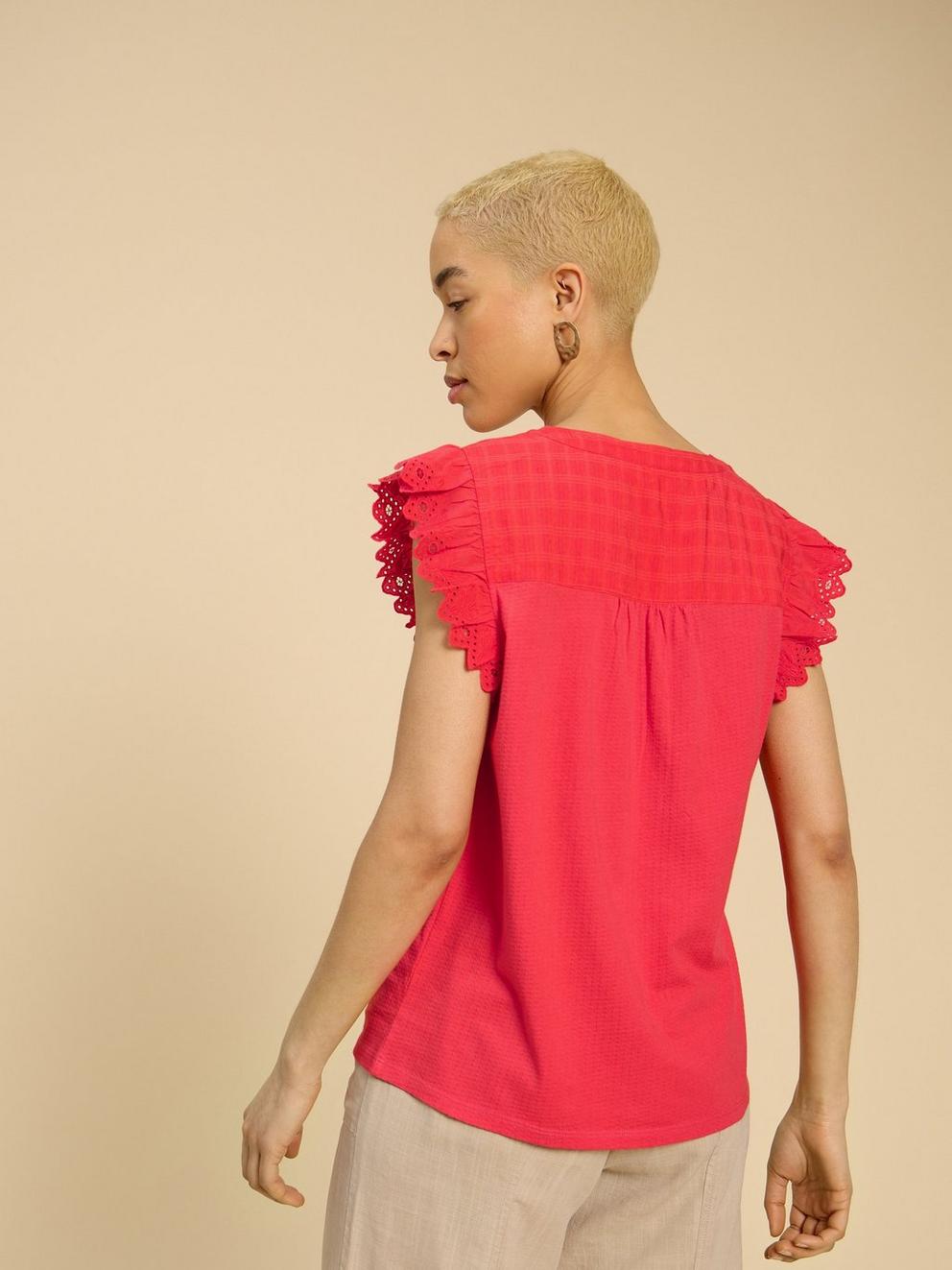 TESSA WOVEN FRILL TOP in BRT ORANGE - MODEL DETAIL