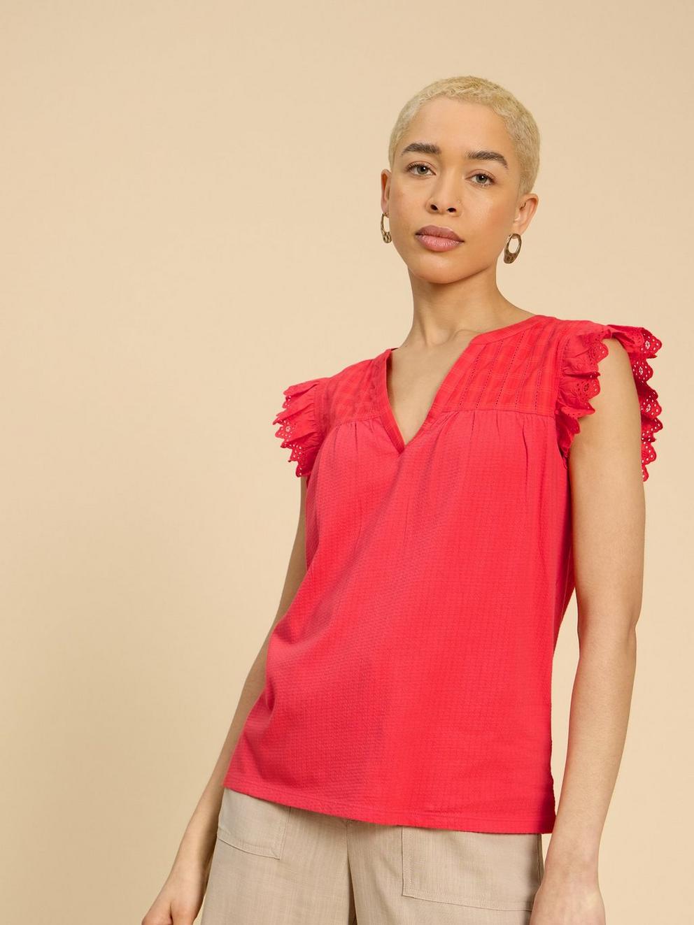 TESSA WOVEN FRILL TOP in BRT ORANGE - MODEL FRONT