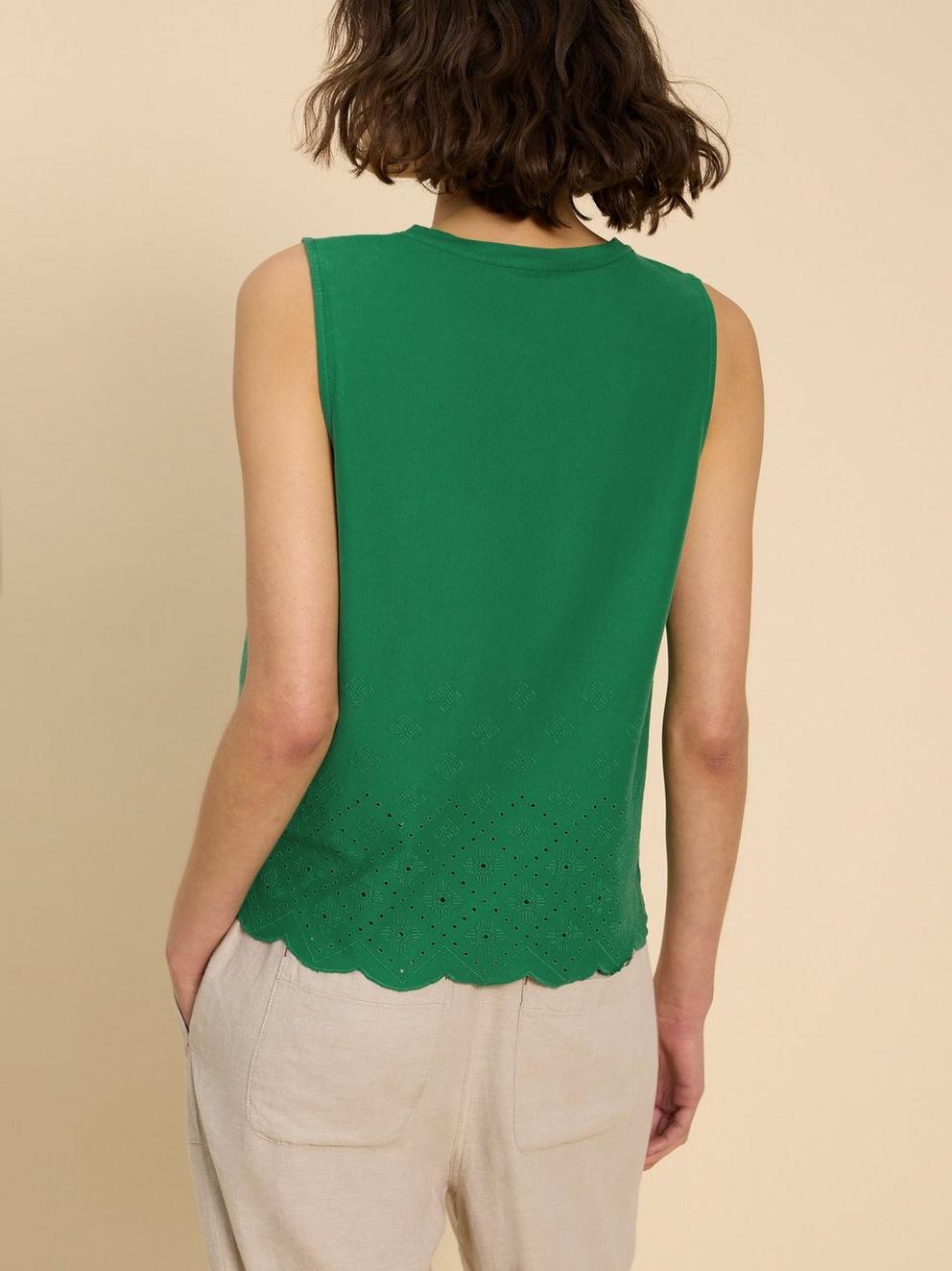 SILVIA CUT OUT VEST in BRT GREEN - MODEL BACK