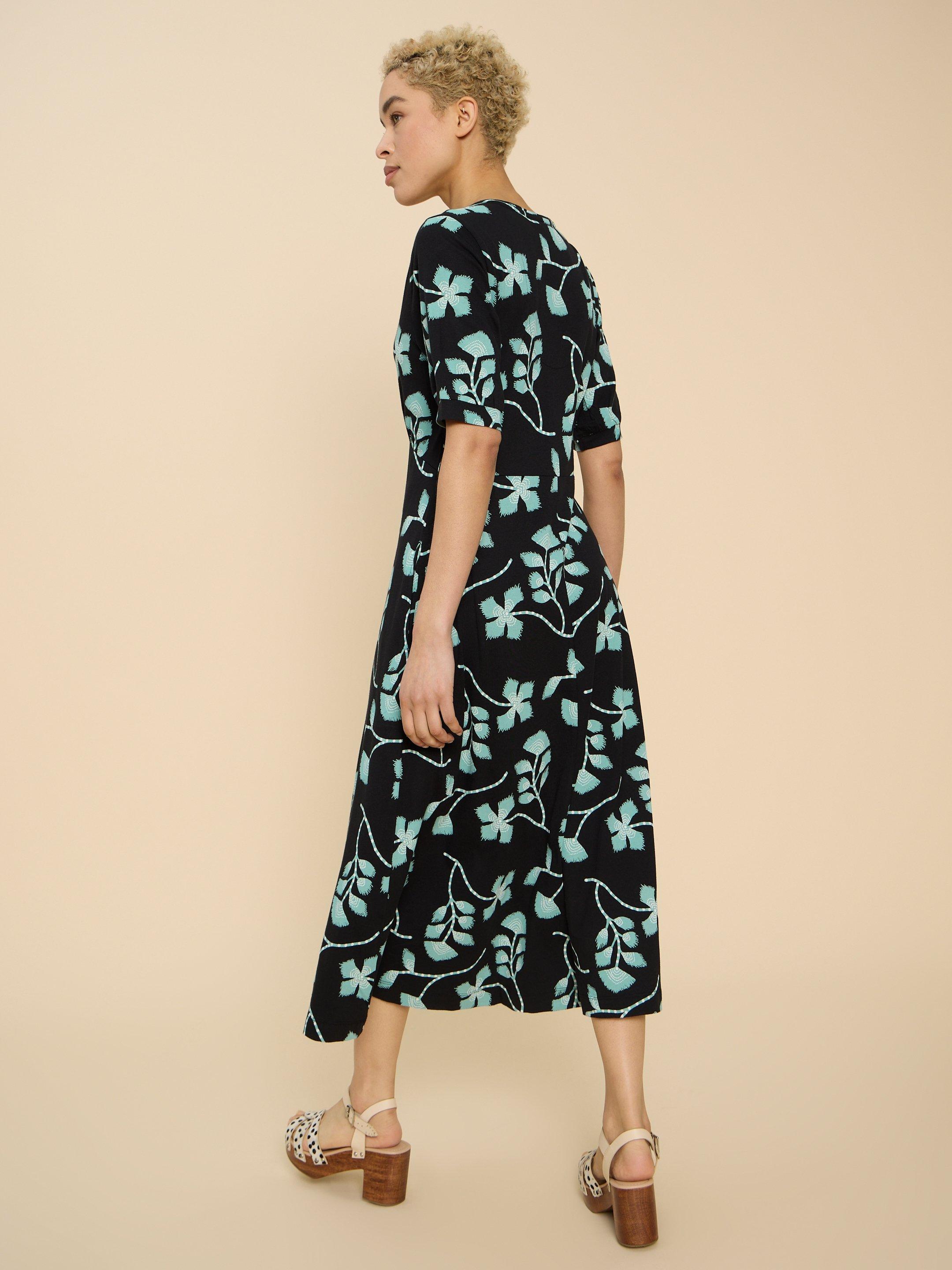 Megan Printed Jersey Midi Dress in BLK MLT - MODEL BACK