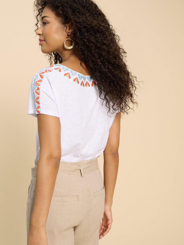 NEVA EMBROIDERED TOP in WHITE MLT - MODEL BACK