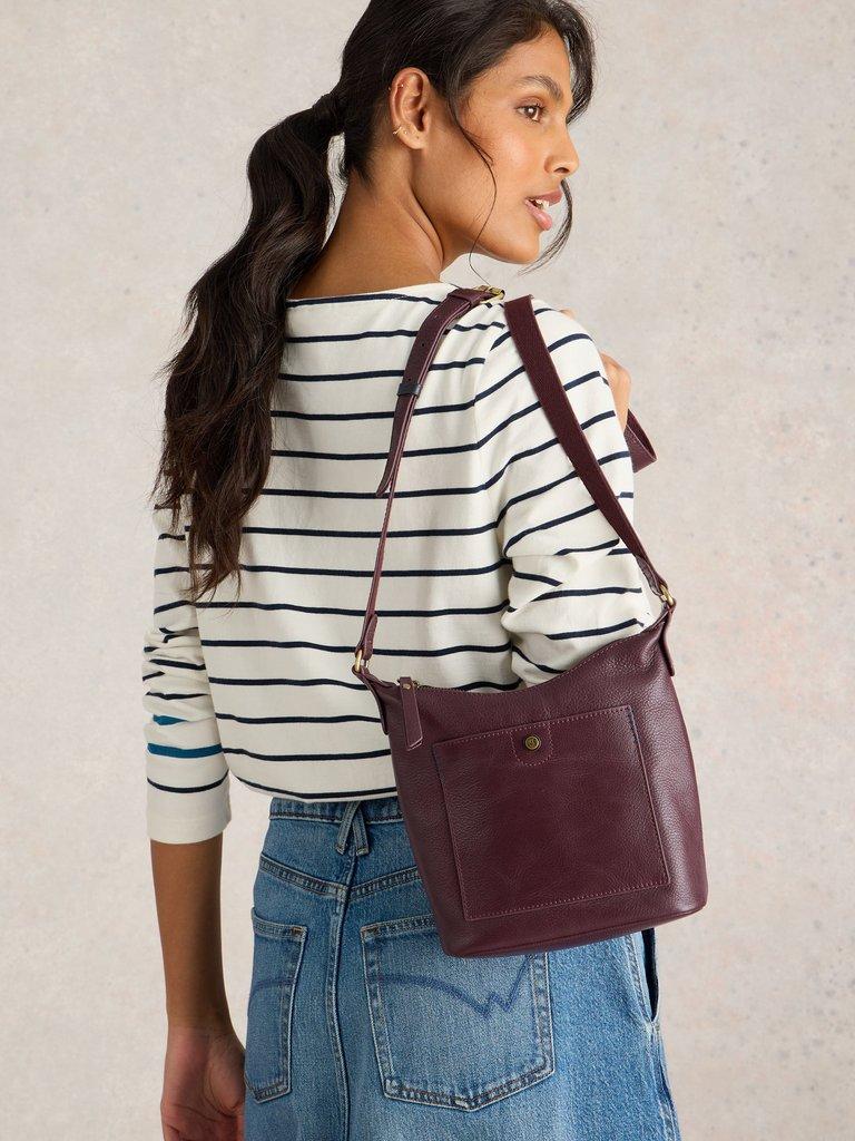 Mini Leather Fern Crossbody in DK PLUM - MODEL FRONT