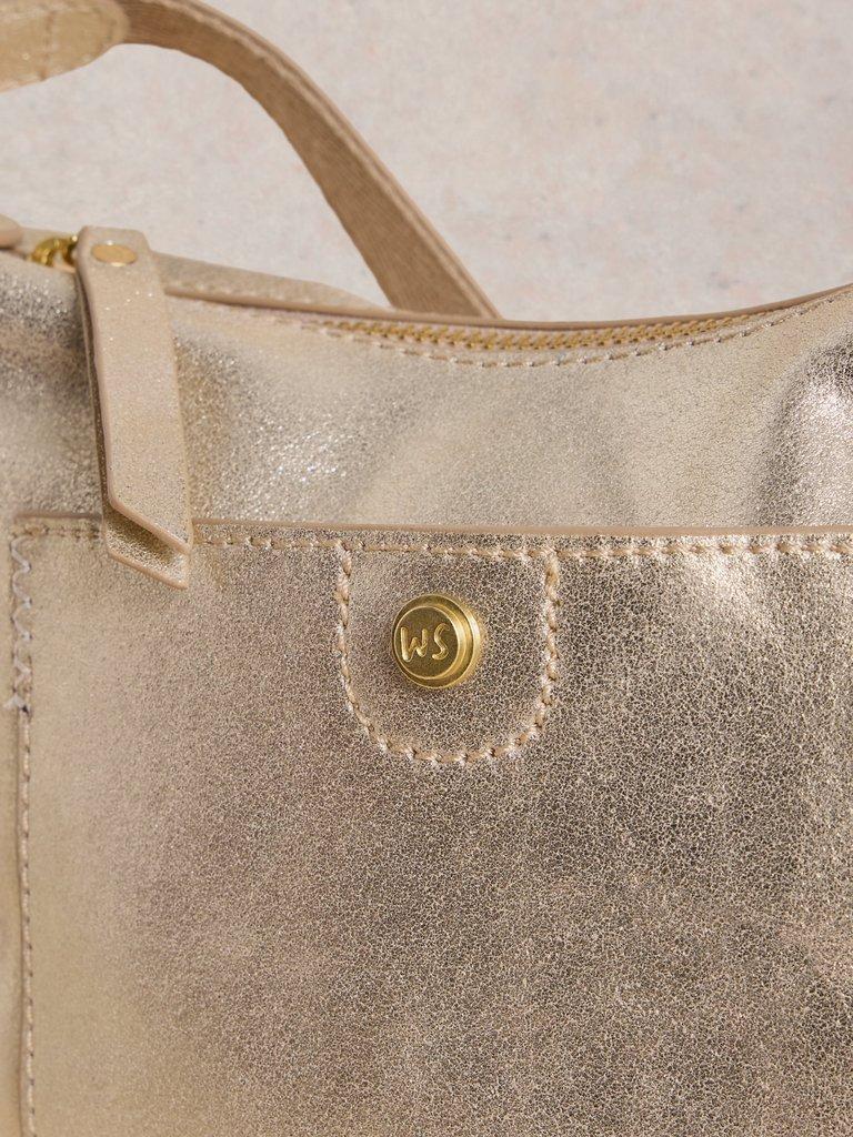 Mini Leather Fern Crossbody in GLD TN MET - MODEL DETAIL