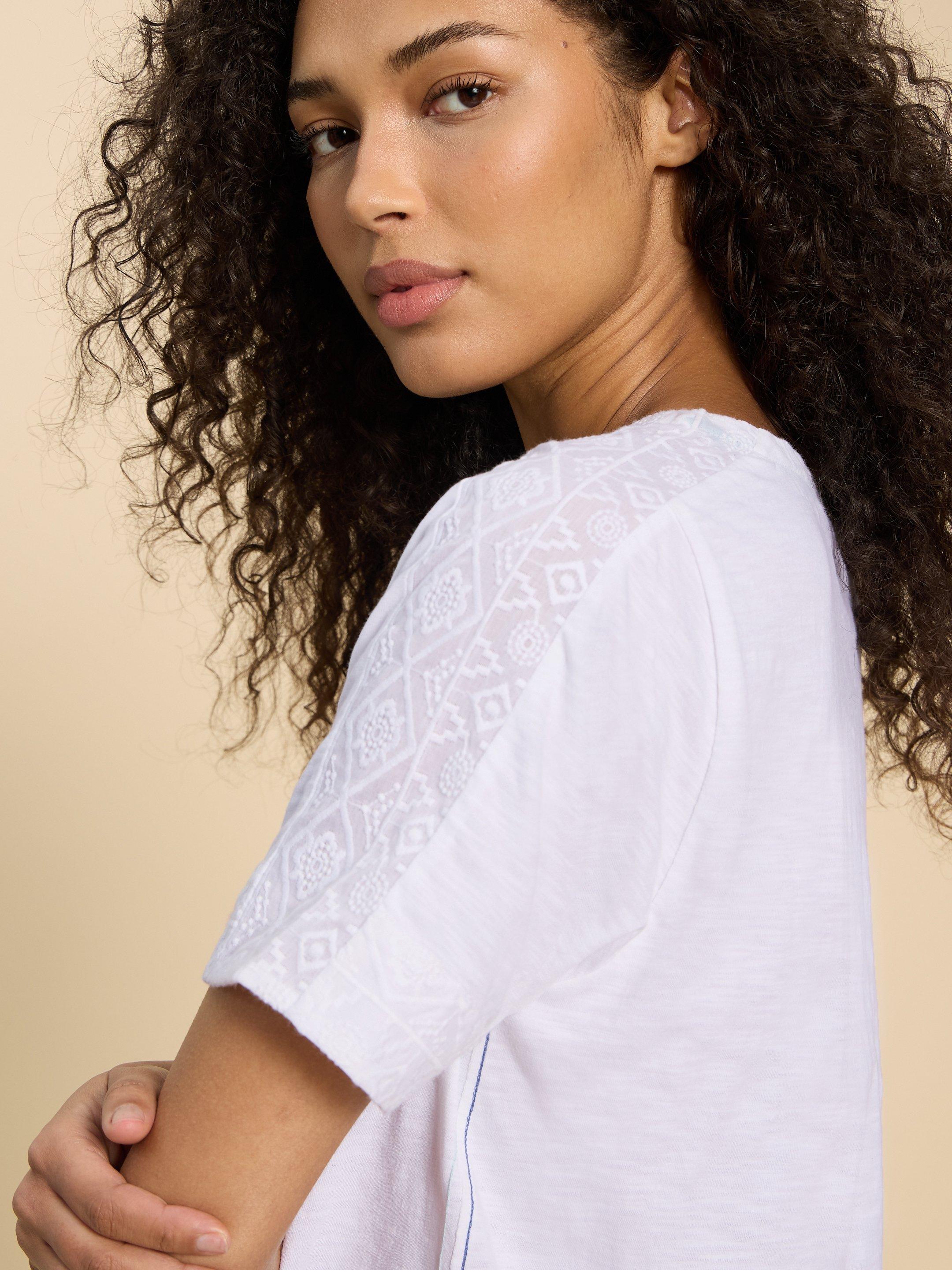 EMBROIDERED TIE HEM TOP in BRIL WHITE - MODEL DETAIL