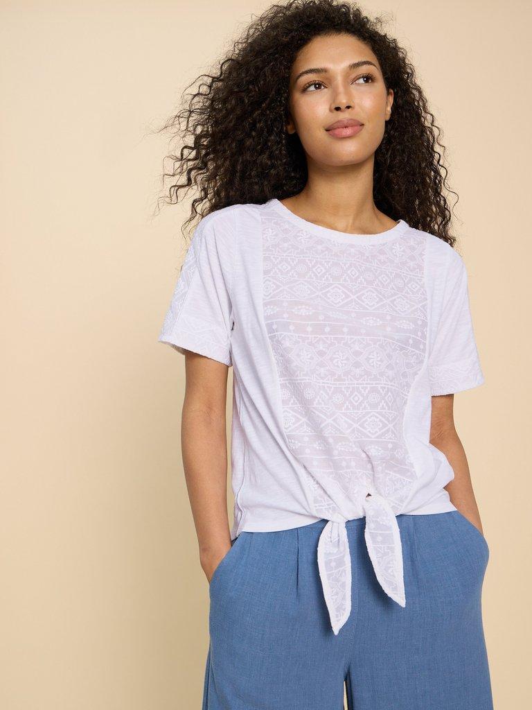 EMBROIDERED TIE HEM TOP in BRIL WHITE - MODEL FRONT