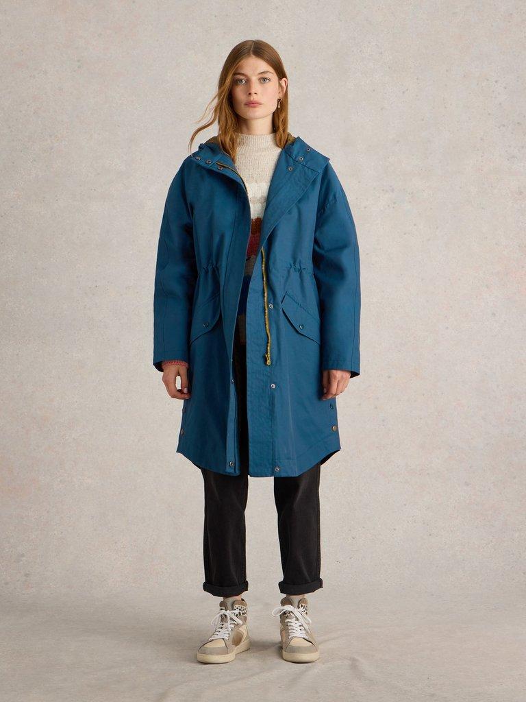 Winnie Waterproof Coat in DK TEAL - MODEL FRONT