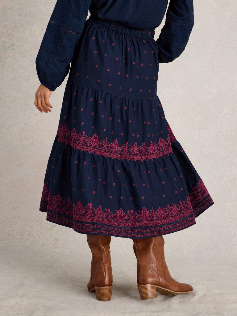 Polly Embroidered Skirt in NAVY MULTI - MODEL BACK