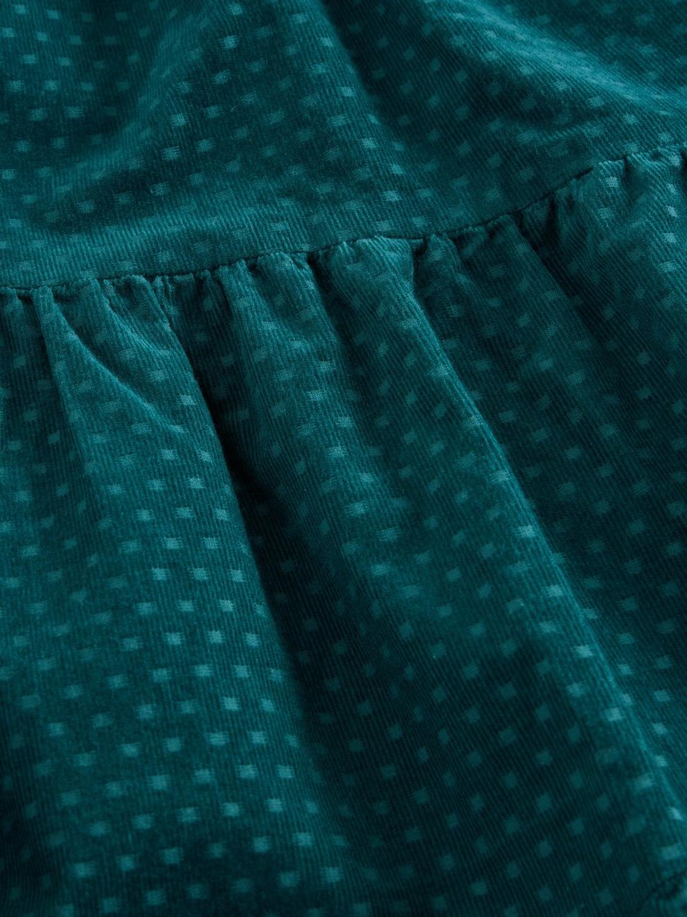 Jenna Cord Tiered Skirt in DK GREEN - FLAT DETAIL