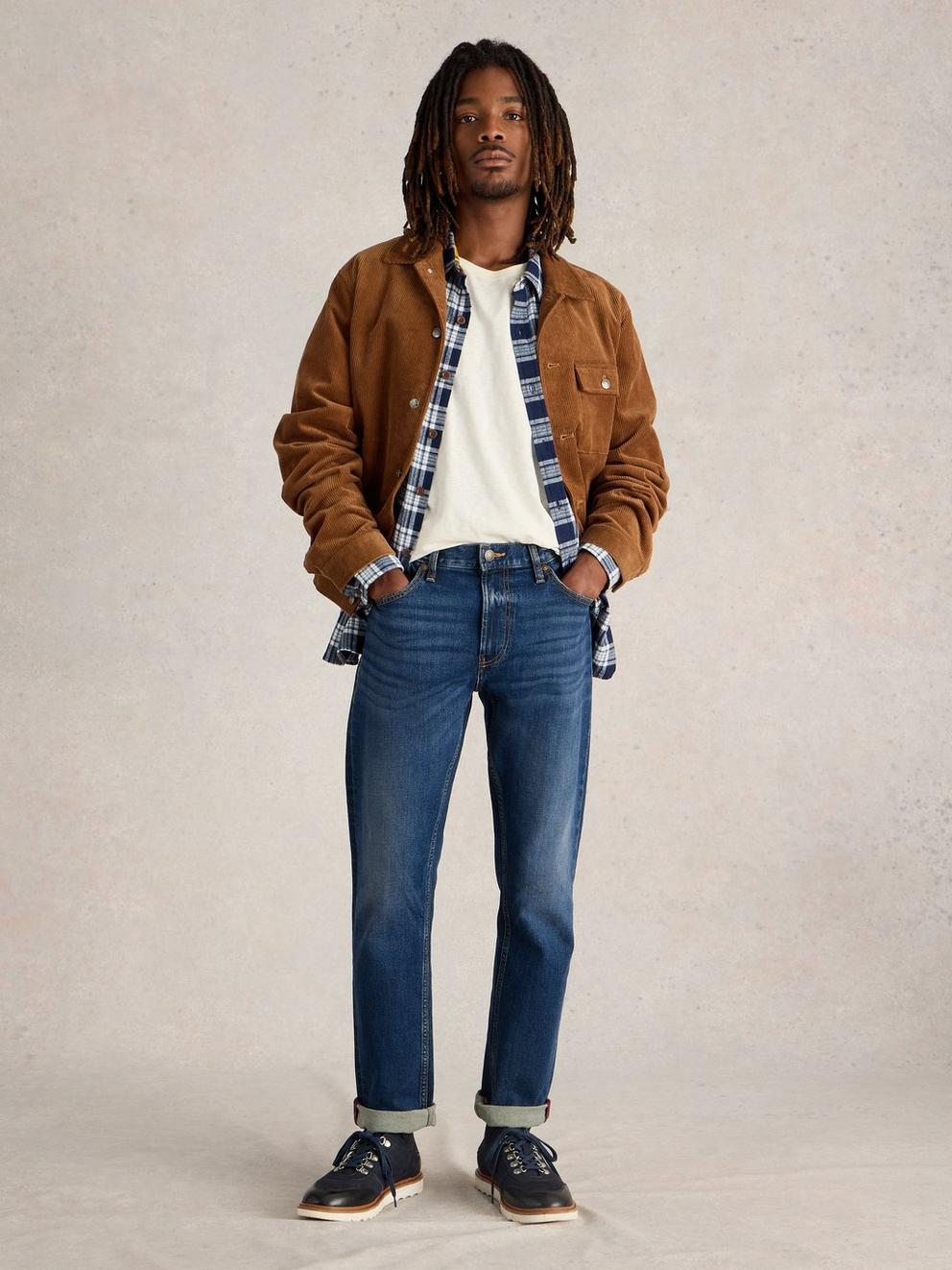 Bronson Slim Jean in MID DENIM - MODEL FRONT