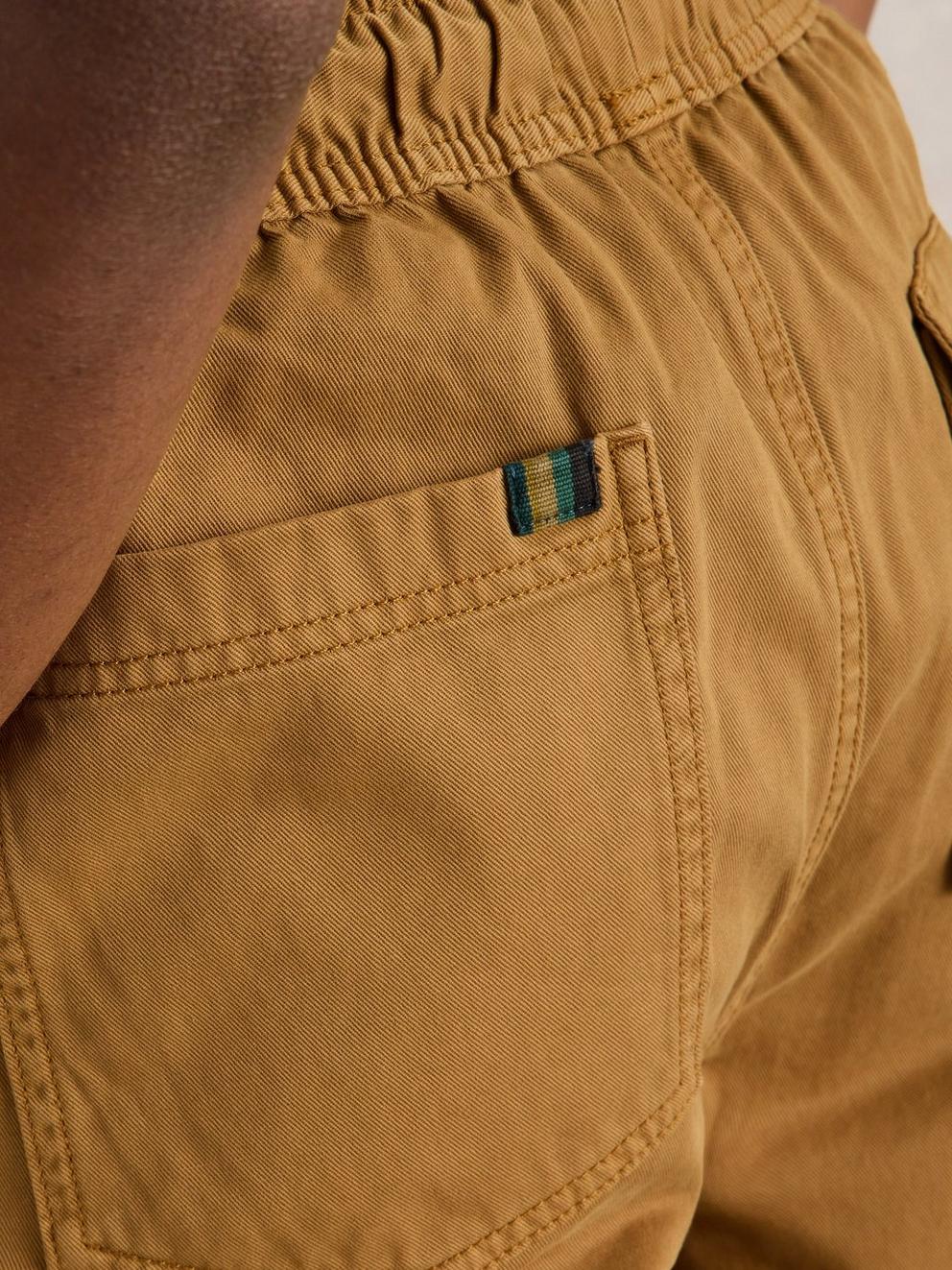 Wren Drawstring Trouser in DARK TAN - MODEL DETAIL