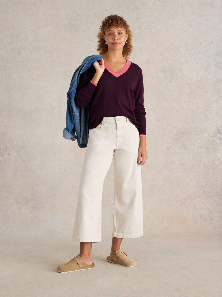 MAGGIE V NECK JUMPER in DK PLUM - MODEL FRONT