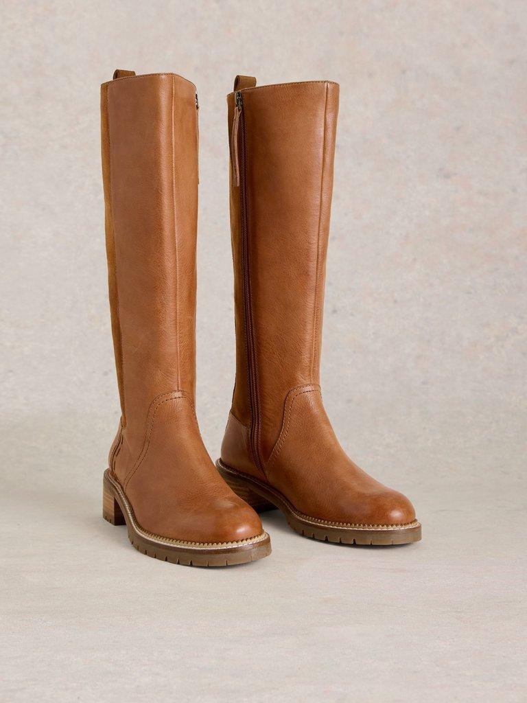 Flat tan knee high boots hotsell