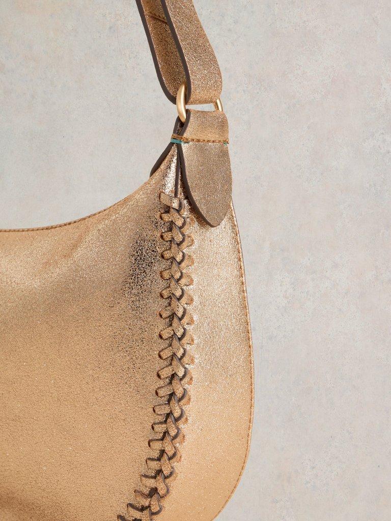 Suzie Swing Convertible Bag in GLD TN MET - MODEL DETAIL