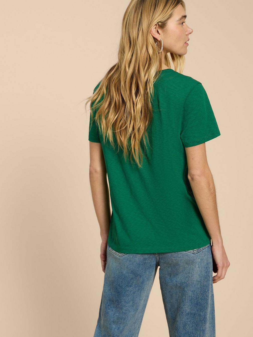 NADIA SS SCOOP NECK TEE in MID GREEN - MODEL BACK