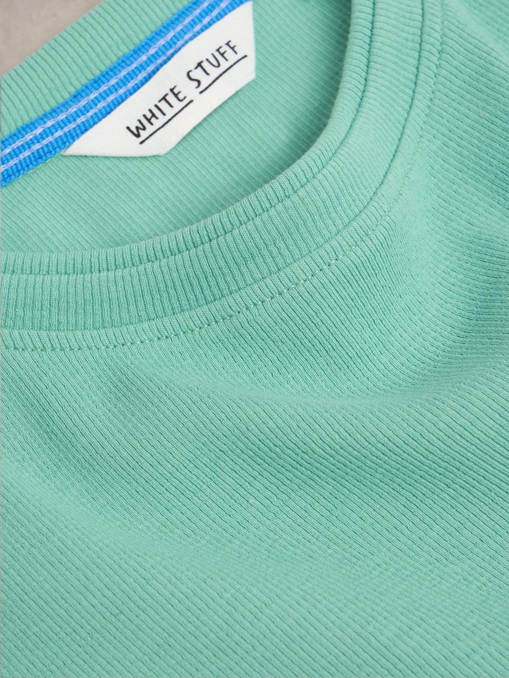 AIDA TEE in MID GREEN - FLAT DETAIL