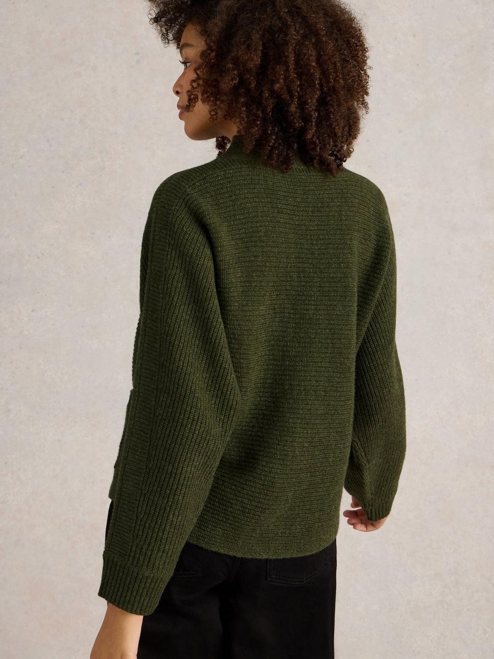 CARLI HIGH NECK WOOL JUMPER in KHAKI GRN - MODEL BACK
