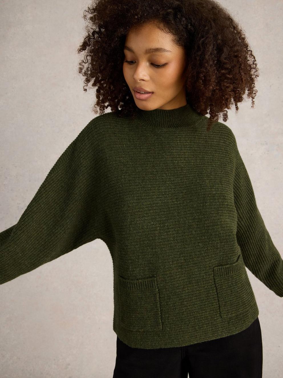 CARLI HIGH NECK WOOL JUMPER in KHAKI GRN - MODEL DETAIL