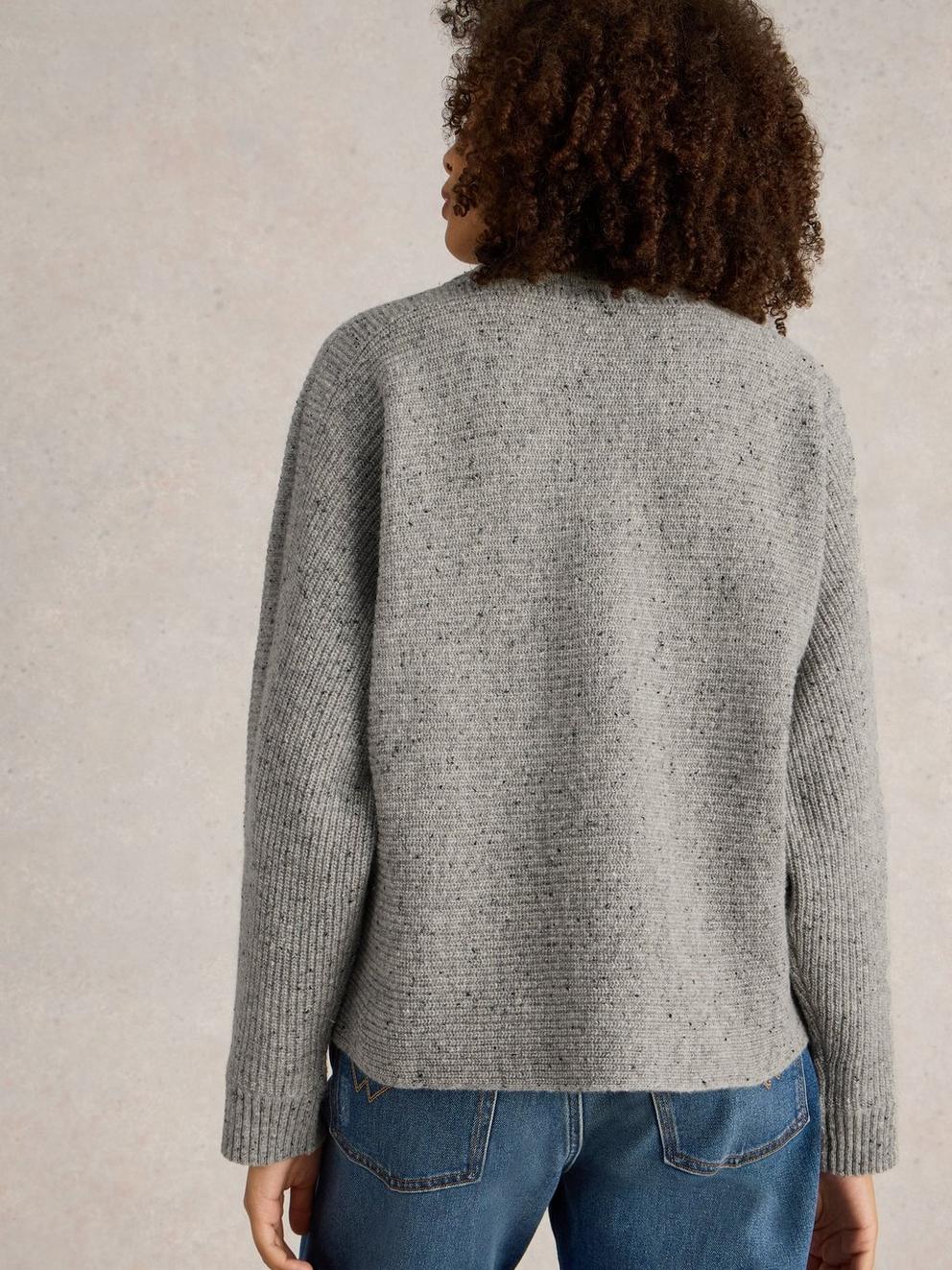 CARLI HIGH NECK WOOL JUMPER in MID GREY - MODEL BACK