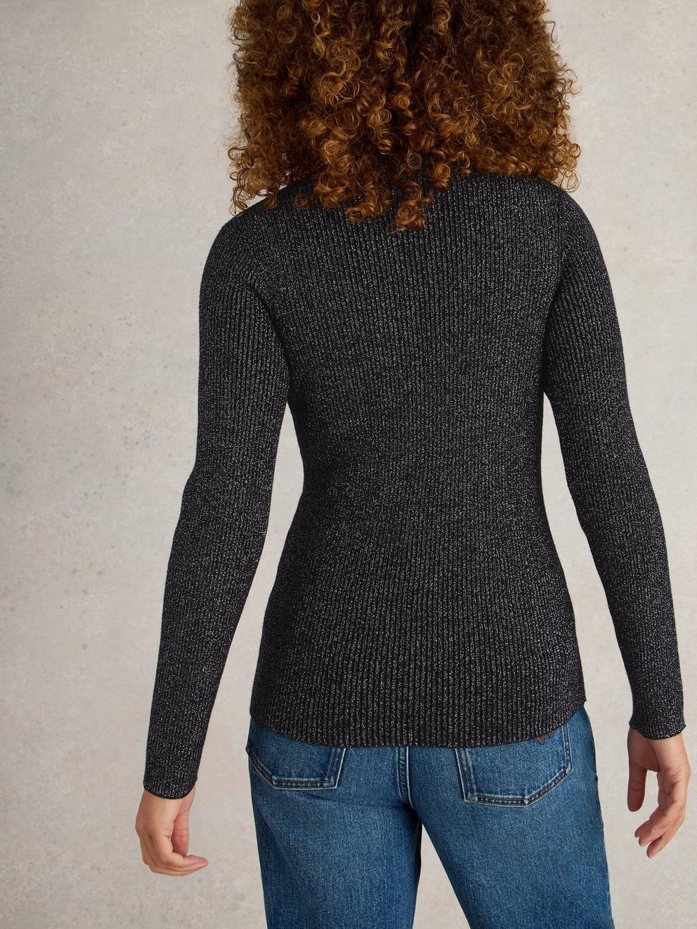 LILA SPARKLE RIB ROLL NECK in PURE BLK - MODEL BACK