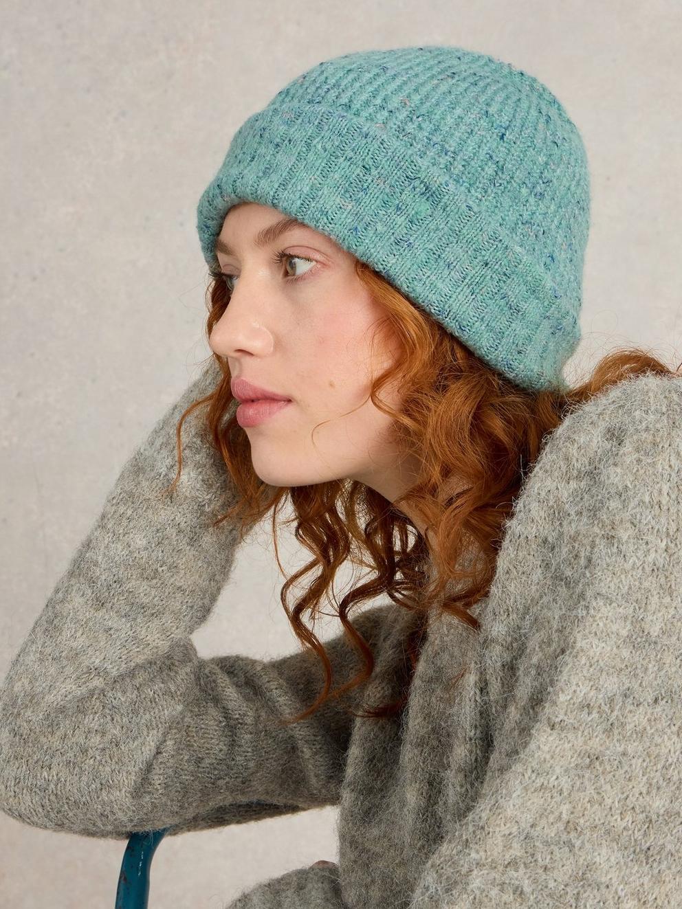 Abby Knitted Beanie in LGT TEAL - MODEL FRONT