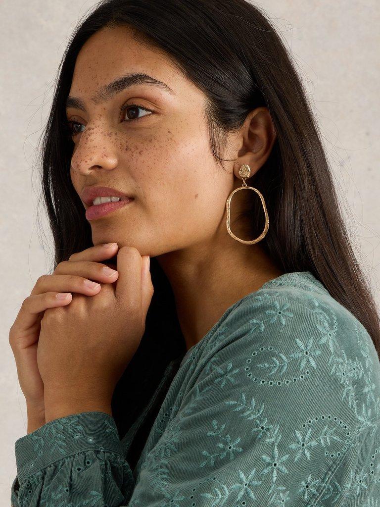 BRYONY HOOP EARRING in GLD TN MET - MODEL FRONT