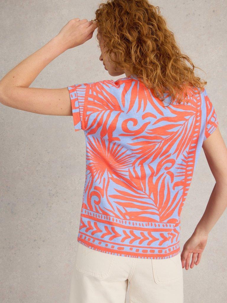 PRINTED NELLY NOTCH TEE in CORAL PR - MODEL BACK